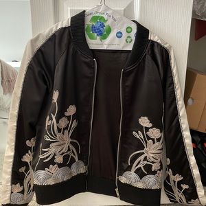 Dance and marvel bomber jacket with knitted flower embellishments